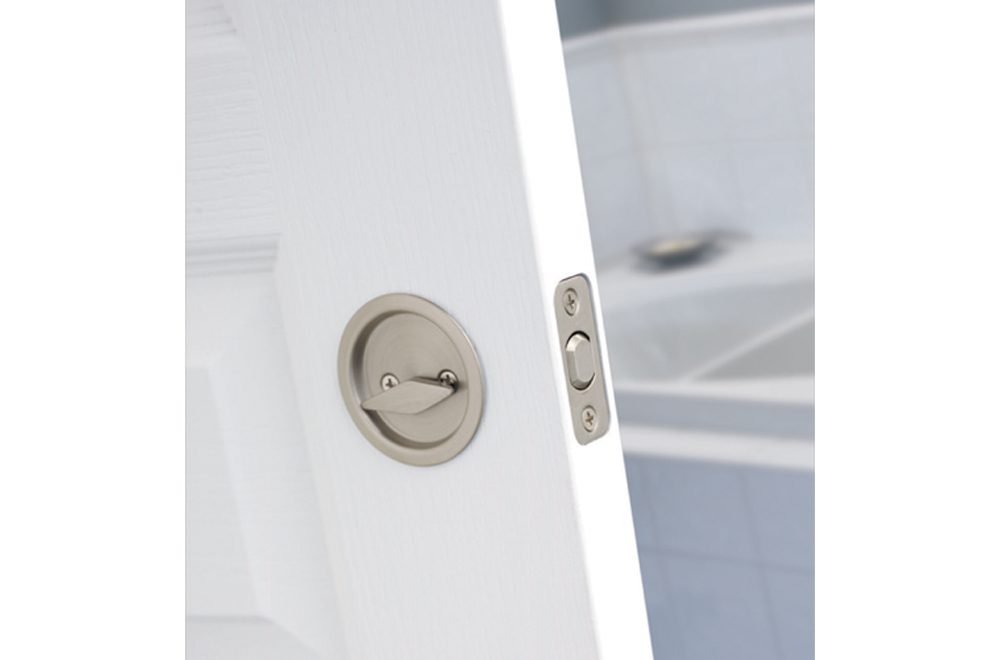 W1031-round-pocket-door-lock-privacy-in-satin-nickel-lifestyle1
